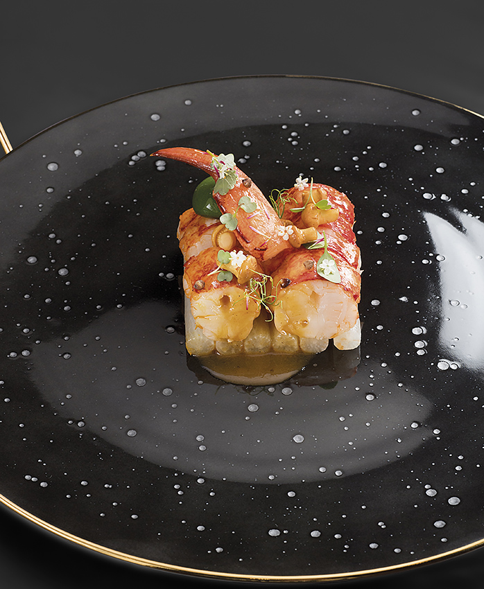 Homard bleu au beurre salé, radis à l’orange et estragon