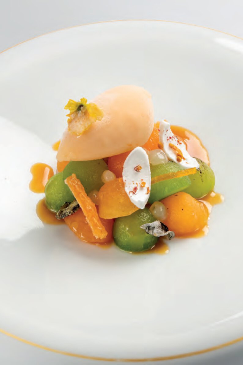 Melon sucrin de tours, biscuit madeleine, meringue, menthe