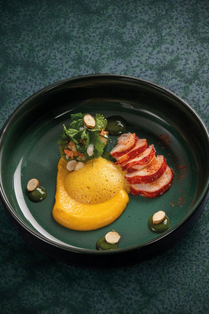 Le taco de homard au potimarron, sauce chimichurri et jus de bisque a l’orange